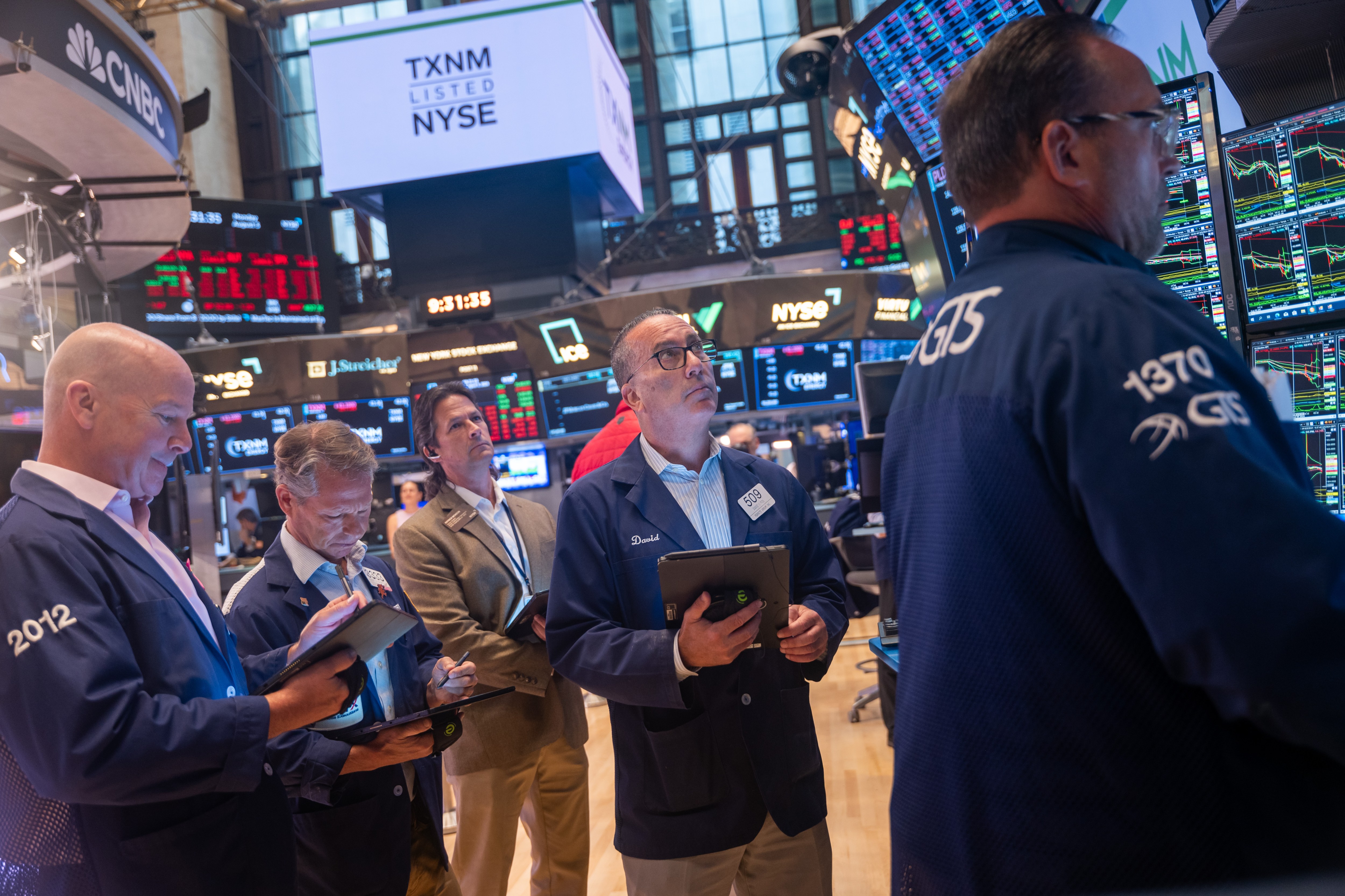 Traders on the floor of the New York Stock Exchange